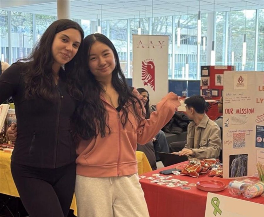 Students at an awareness booth on campus